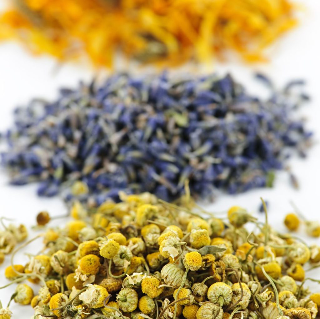 Use dried herbs such as chamomile, lavender and calendula to make treats for your chickens.
